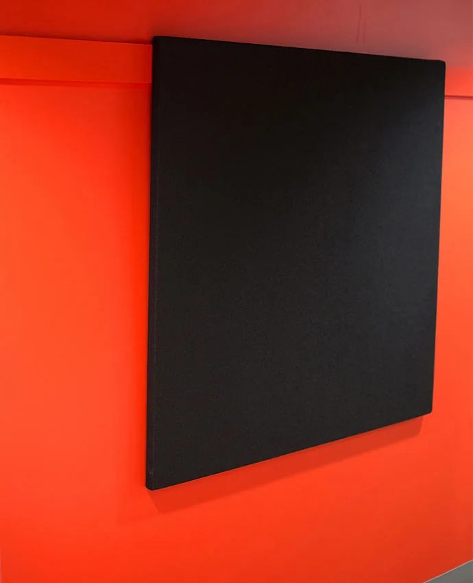 Single panel mounted on red wall